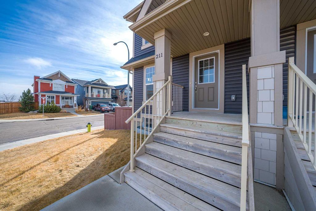 Photo of 211 Fireside Drive, Cochrane, AB T4C 2L4 (MLS # A2295447)