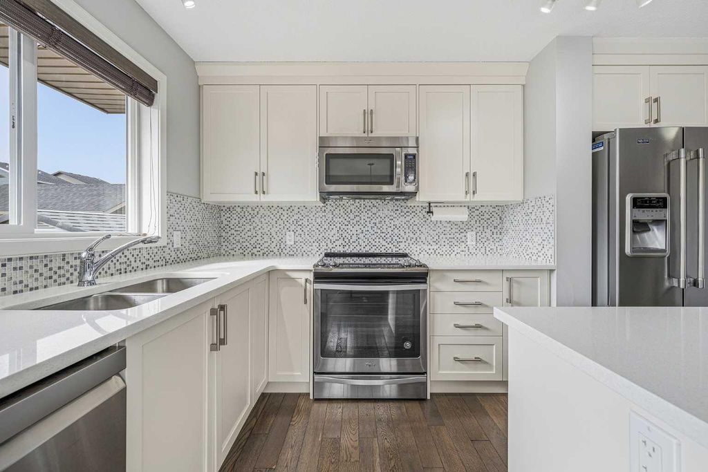 Photo of 211 Fireside Drive, Cochrane, AB T4C 2L4 (MLS # A2295447)