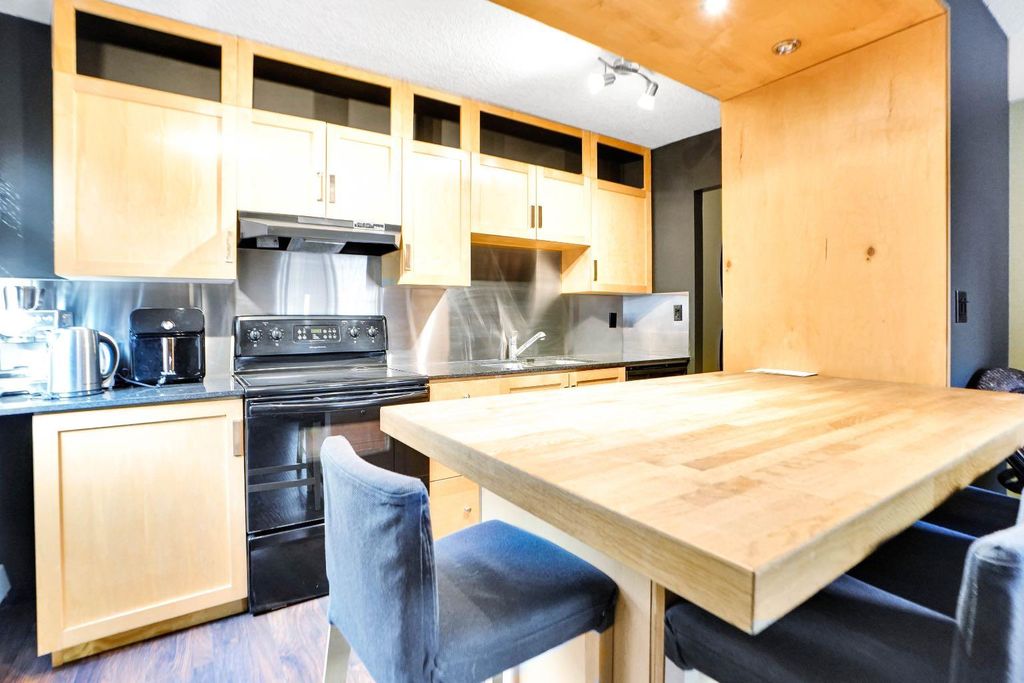Photo of 823 19 Avenue SW #405, Calgary, AB T2T 0H6 (MLS # A2311506)