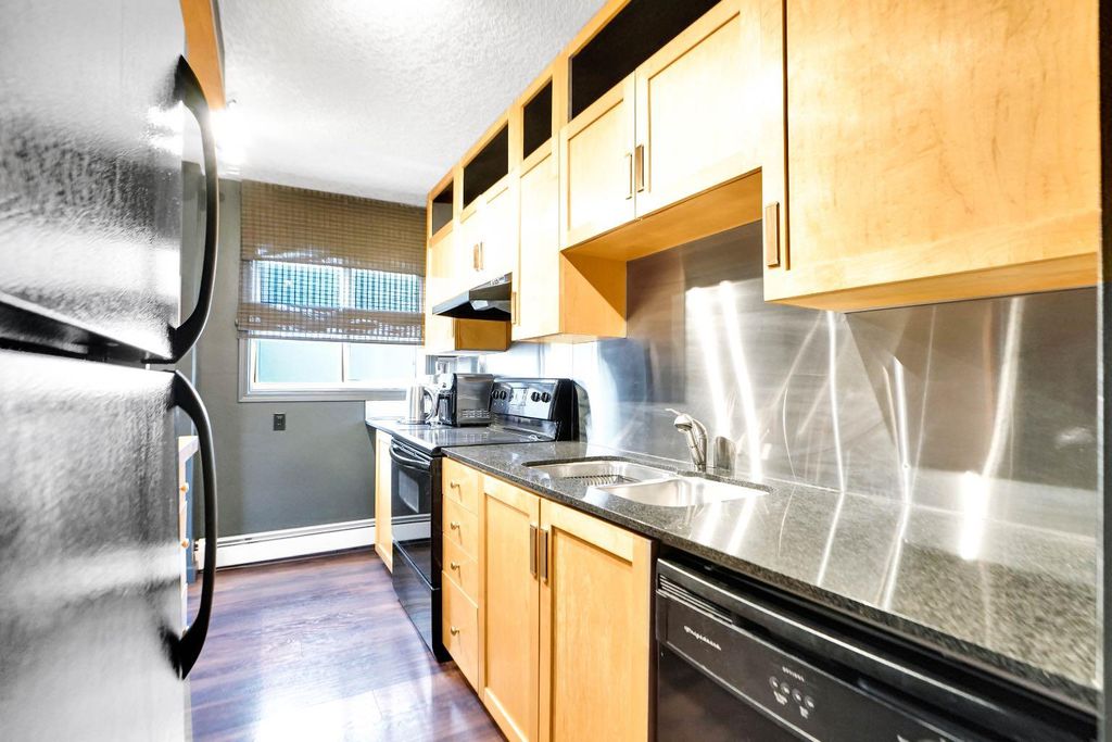 Photo of 823 19 Avenue SW #405, Calgary, AB T2T 0H6 (MLS # A2311506)