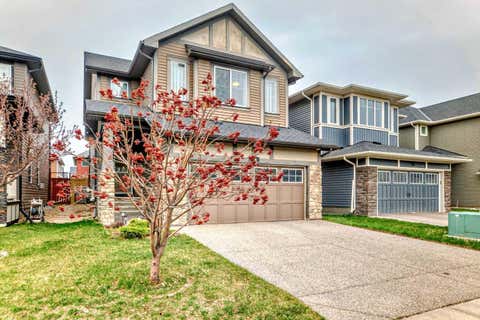 Photo of 156 Cougar Ridge Manor SW, Calgary, AB T3H 0V4 (MLS # A2318711)