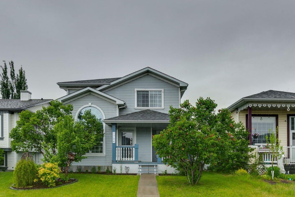 Photo of 1704 Woodside Boulevard NW, Airdrie, AB T4B 2K1 (MLS # A2348790)