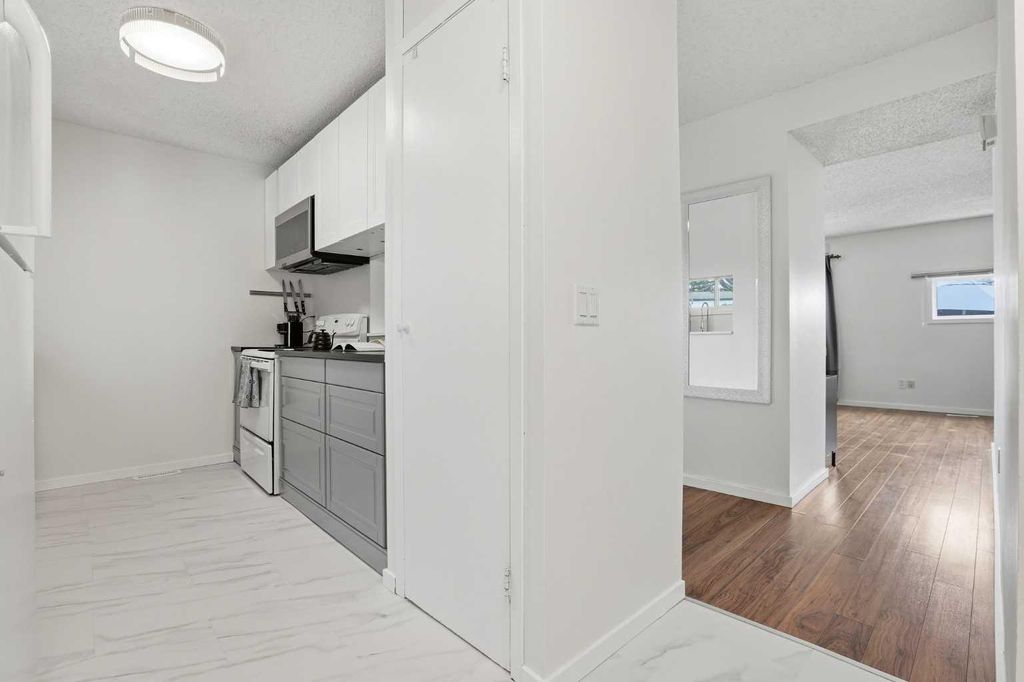 Photo of 131 Templehill Drive NE #13, Calgary, AB T1Y 4T1 (MLS # A2316541)