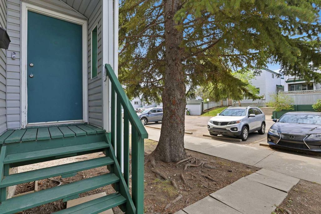Photo of 131 Templehill Drive NE #13, Calgary, AB T1Y 4T1 (MLS # A2316541)