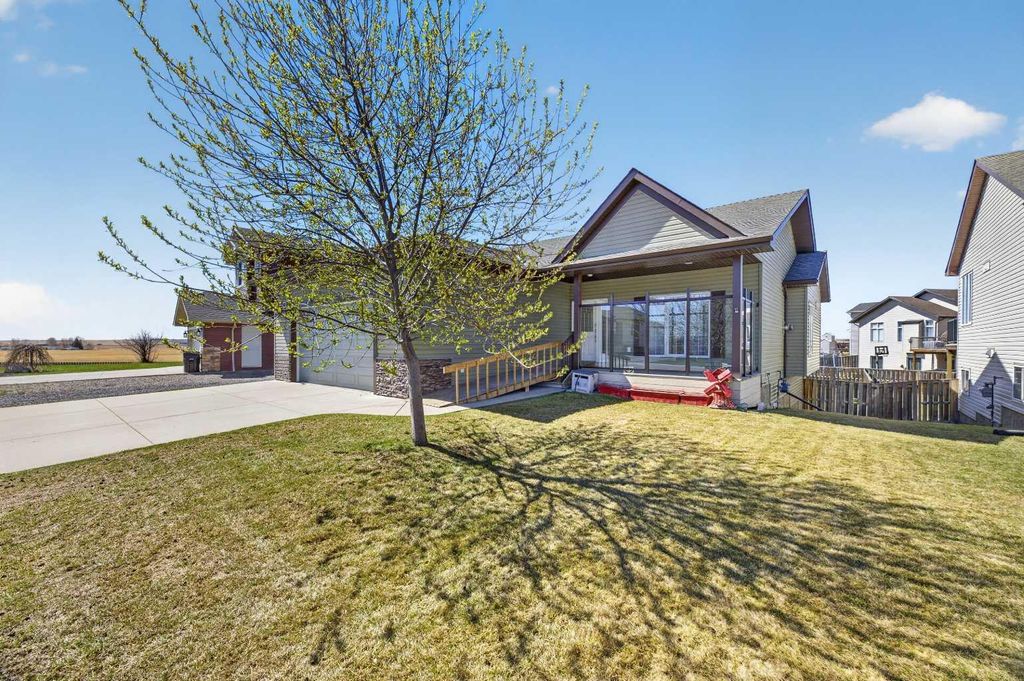 Photo of 700 Carriage Lane #11, Carstairs, AB T0M 0N0 (MLS # A2306357)