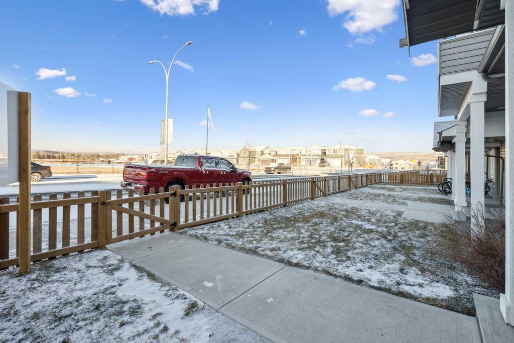 Photo of 24 Rivercrest Drive #101, Cochrane, AB T4C 2V2 (MLS # A2286814)