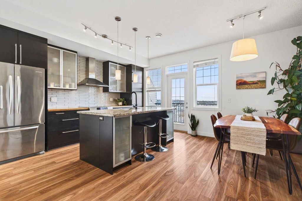 Photo of 43 Springborough Boulevard SW #9, Calgary, AB T3H 5V8 (MLS # A2283025)