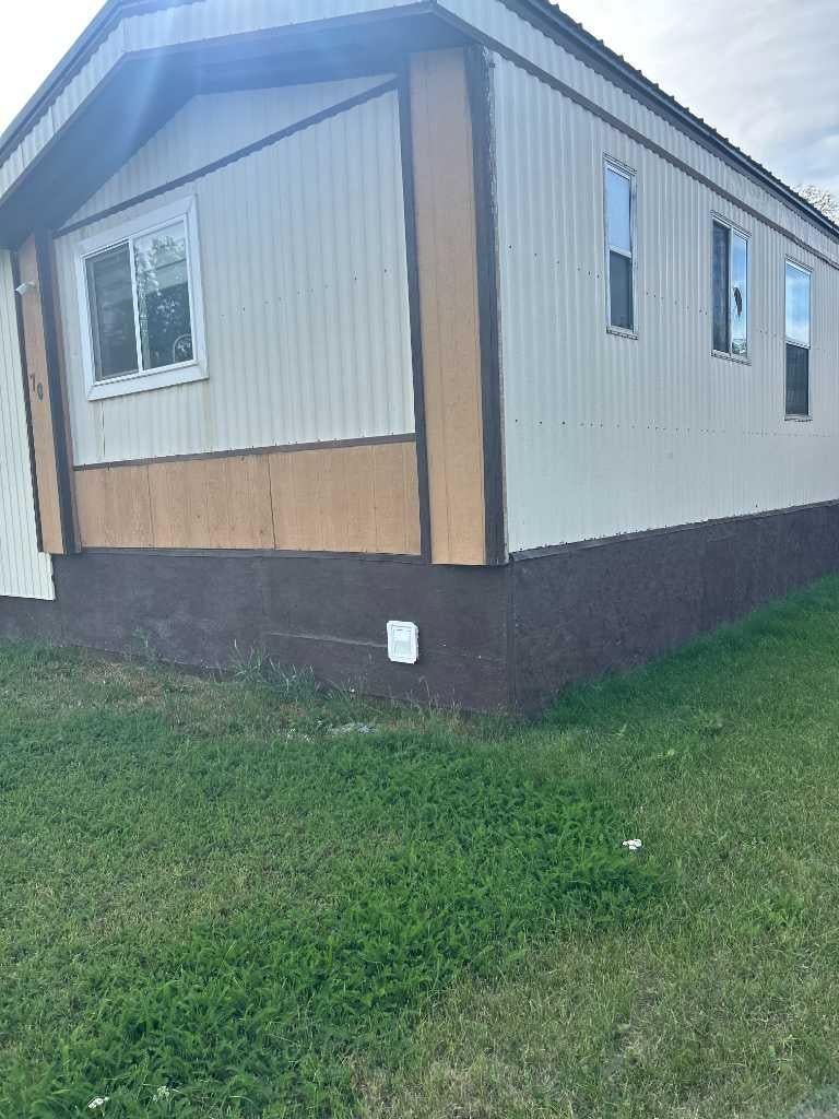 Photo of 70 Manor Park Crescent E, Brooks, AB T1R 0P5 (MLS # A2338875)