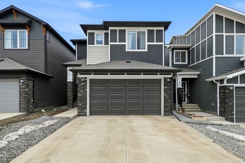 Photo of 902 Bluerock Way SW, Calgary, AB T2Y 0S5 (MLS # A2304430)