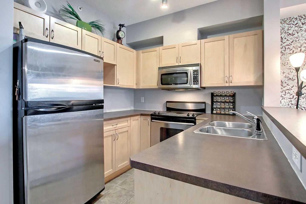 Photo of 70 Panamount Drive NW #9303, Calgary, AB T3K 6K6 (MLS # A2293894)