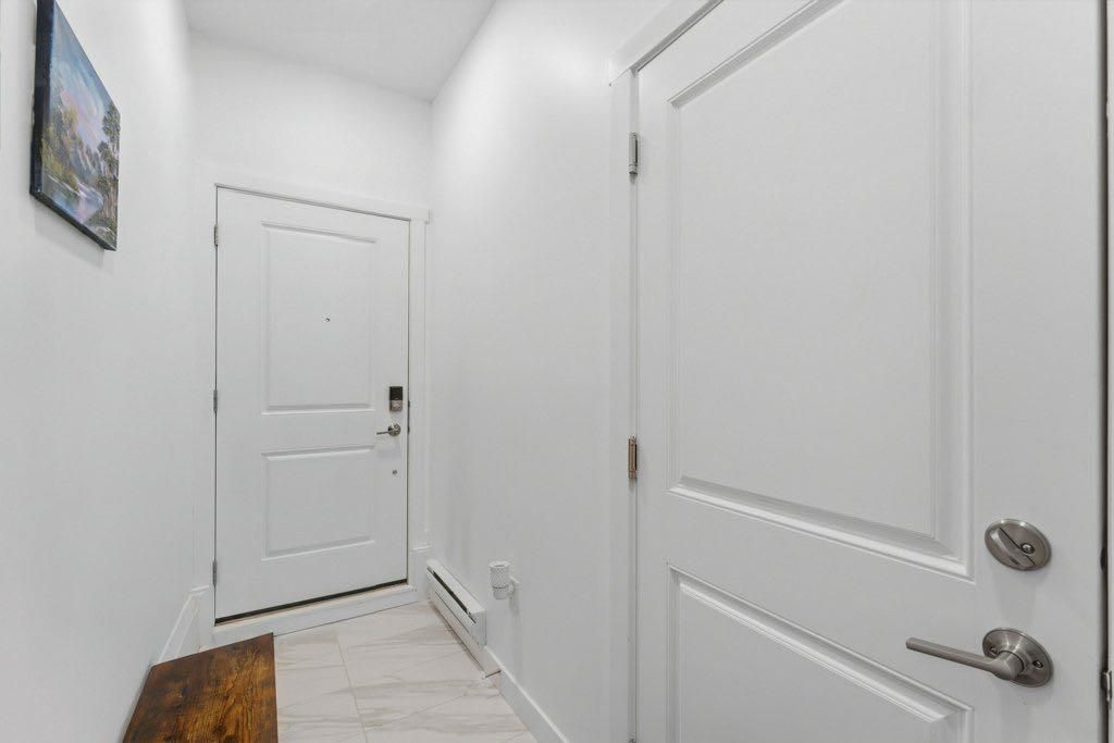 Photo of 33 Merganser Drive W #804, Chestermere, AB T1X 2S3 (MLS # A2284894)