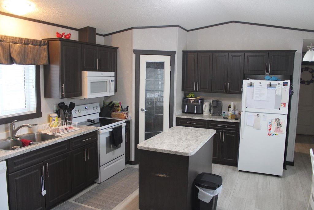 Photo of 503 2 Avenue, Turtleford, SK S0M 2Y0 (MLS # A2291008)