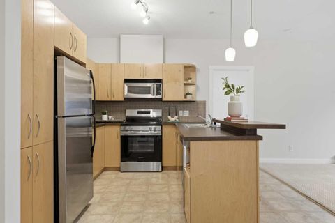 Photo of 69 Springborough Court SW #125, Calgary, AB T3H 5V5 (MLS # A2280142)