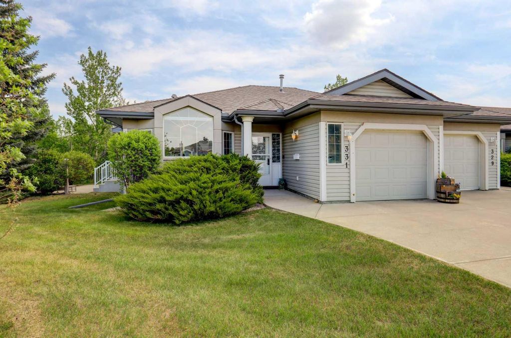 Photo of 331 Triune Bay, Rural Rocky View County, AB T1X 1G4 (MLS # A2316281)