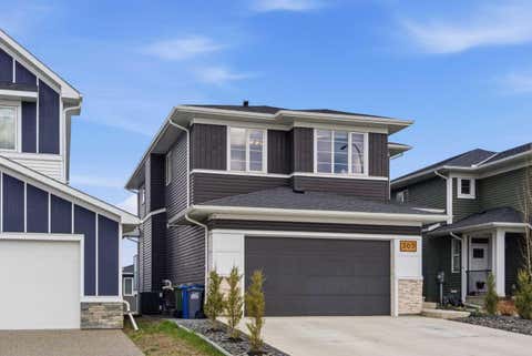 Photo of 303 Rivercrest Boulevard, Cochrane, AB T4C 2V1 (MLS # A2307772)