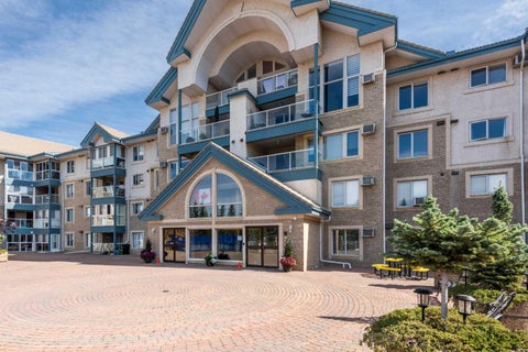Photo of 7229 SIerra Morena Boulevard SW #220, Calgary, AB T3H 3L8 (MLS # A2345945)