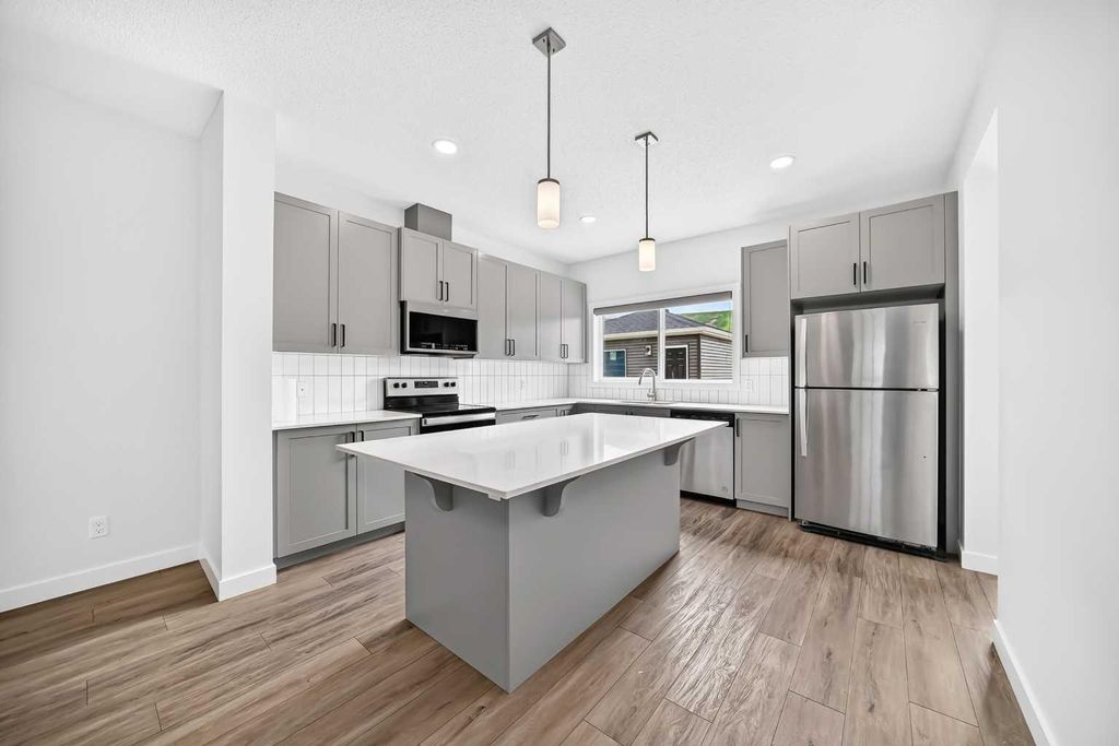 Photo of 339 WOLF CREEK Way SE, Calgary, AB T2X 4Y8 (MLS # A2324786)