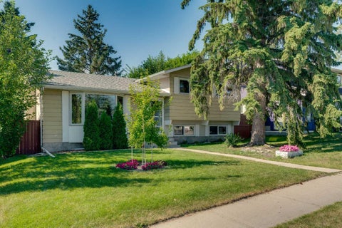 Photo of 335 Queensland Drive SE, Calgary, AB T2J 3R6 (MLS # A2345609)
