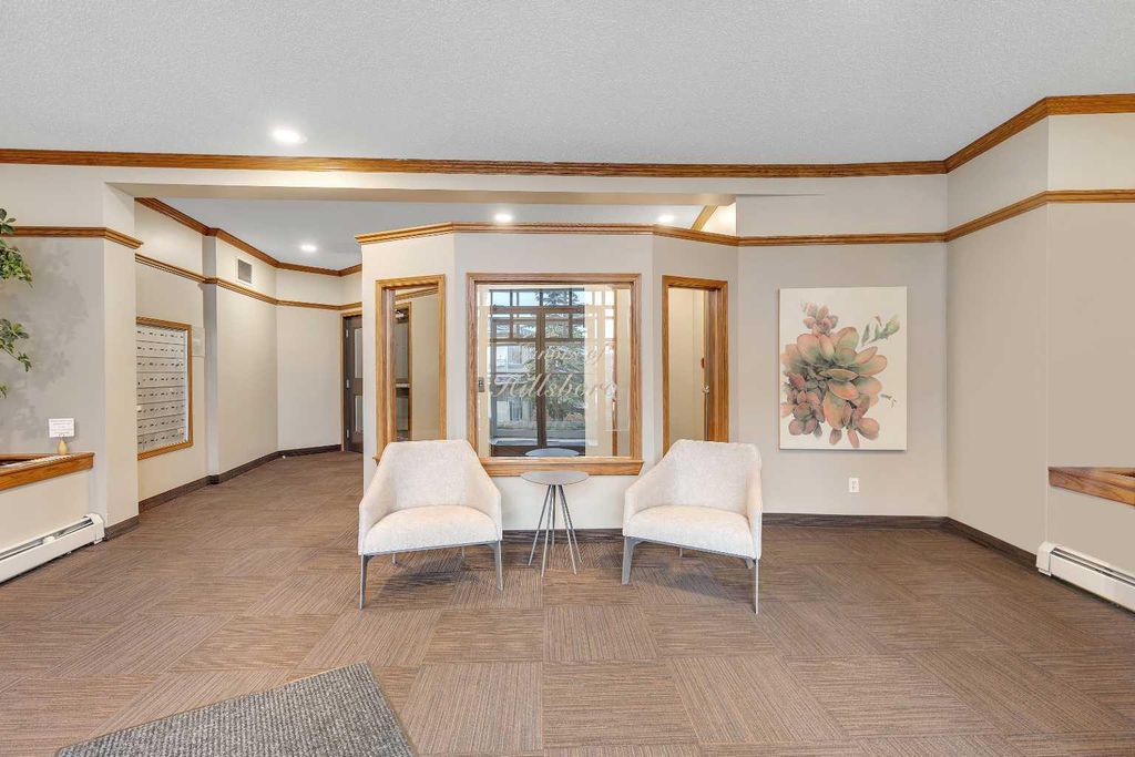 Photo of 108 Edgeridge Terrace NW #107, Calgary, AB T3A 6C4 (MLS # A2277484)