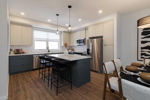Photo of 30 Creekside Villas SW #706, Calgary, AB T1T 1Z1 (MLS # A2287055)