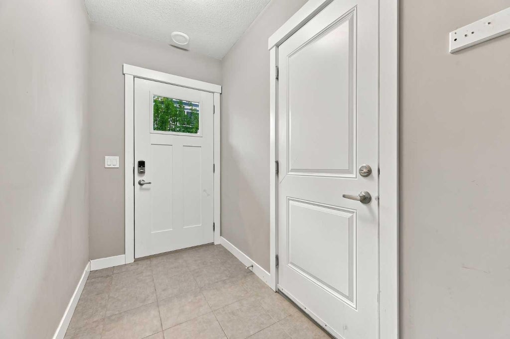 Photo of 32 Horseshoe Crescent #1604, Cochrane, AB T4C 2P4 (MLS # A2350111)