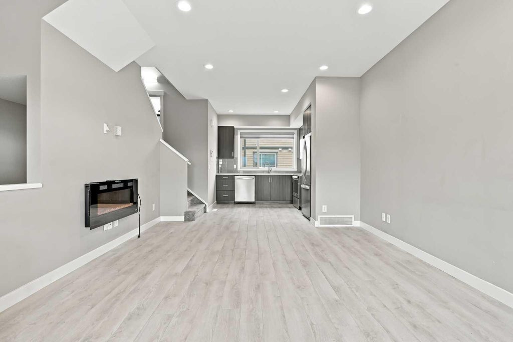 Photo of 32 Horseshoe Crescent #1604, Cochrane, AB T4C 2P4 (MLS # A2350111)