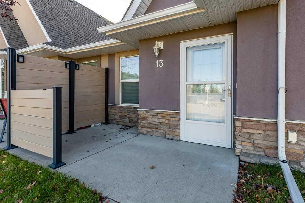 Photo of 24 River Heights View #13, Cochrane, AB T4C 0M9 (MLS # A2266986)