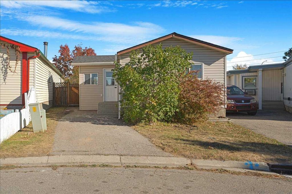 Photo of 210 Erin woods Circle SE, Calgary, AB T2B 3E1 (MLS # A2265036)