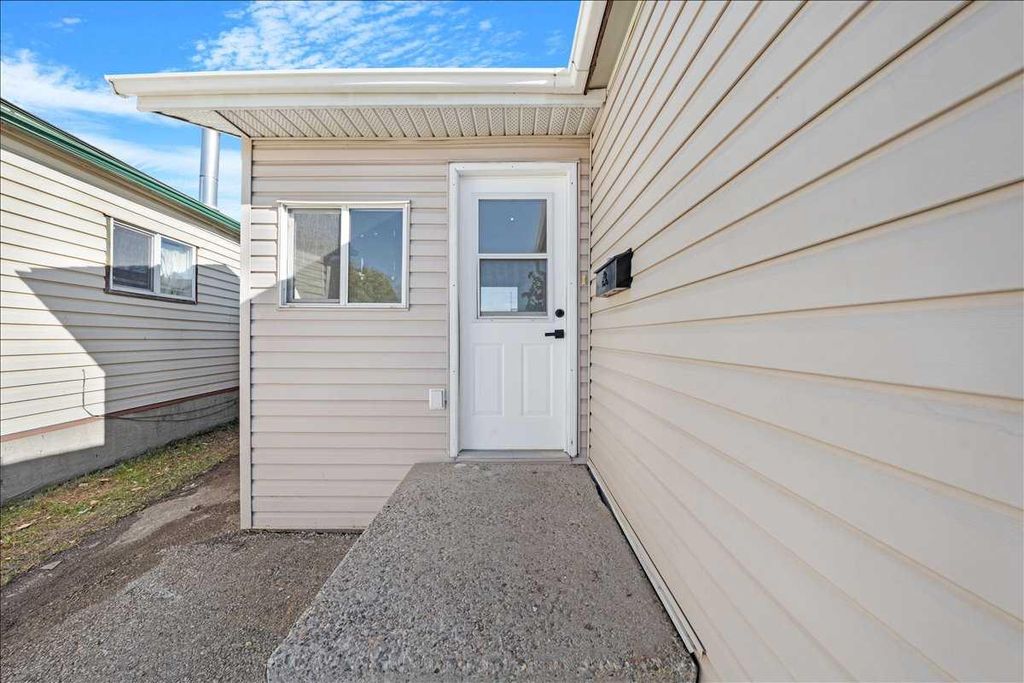 Photo of 210 Erin woods Circle SE, Calgary, AB T2B 3E1 (MLS # A2265036)