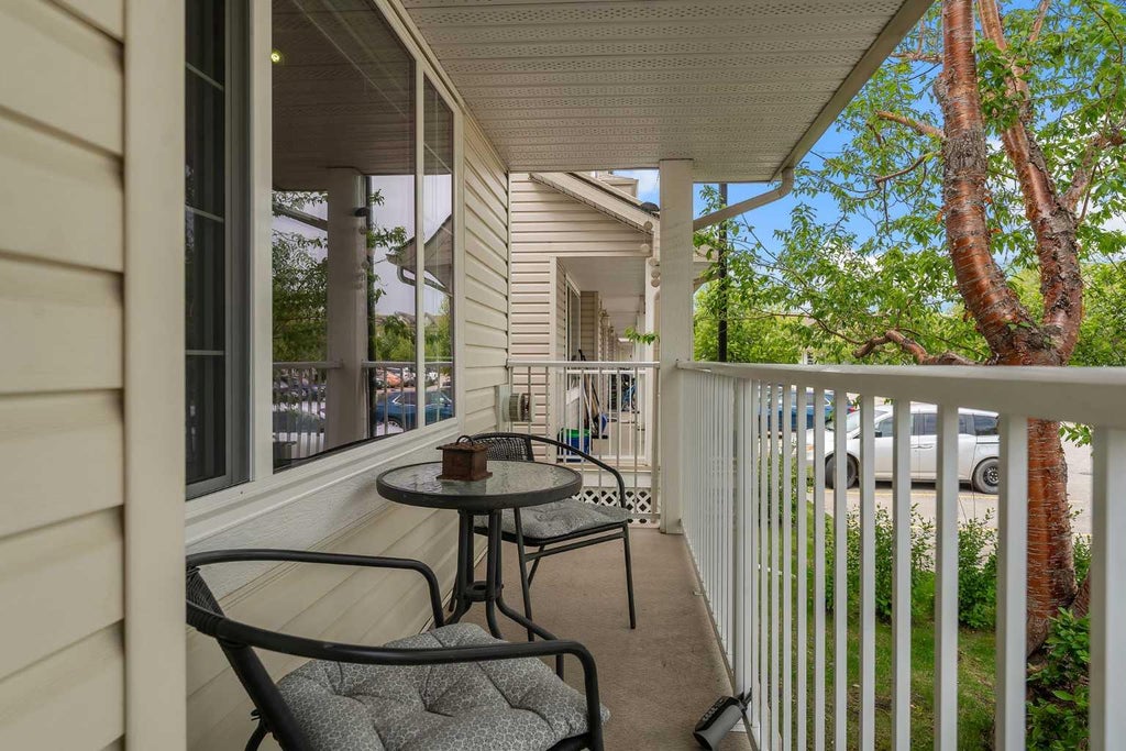 Photo of 4 Stonegate Drive NW #27, Airdrie, AB T4B 2T2 (MLS # A2317940)