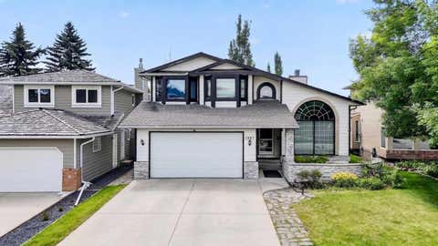 Photo of 1387 Sunwood Road SE, Calgary, AB T2X 2L5 (MLS # A2320243)
