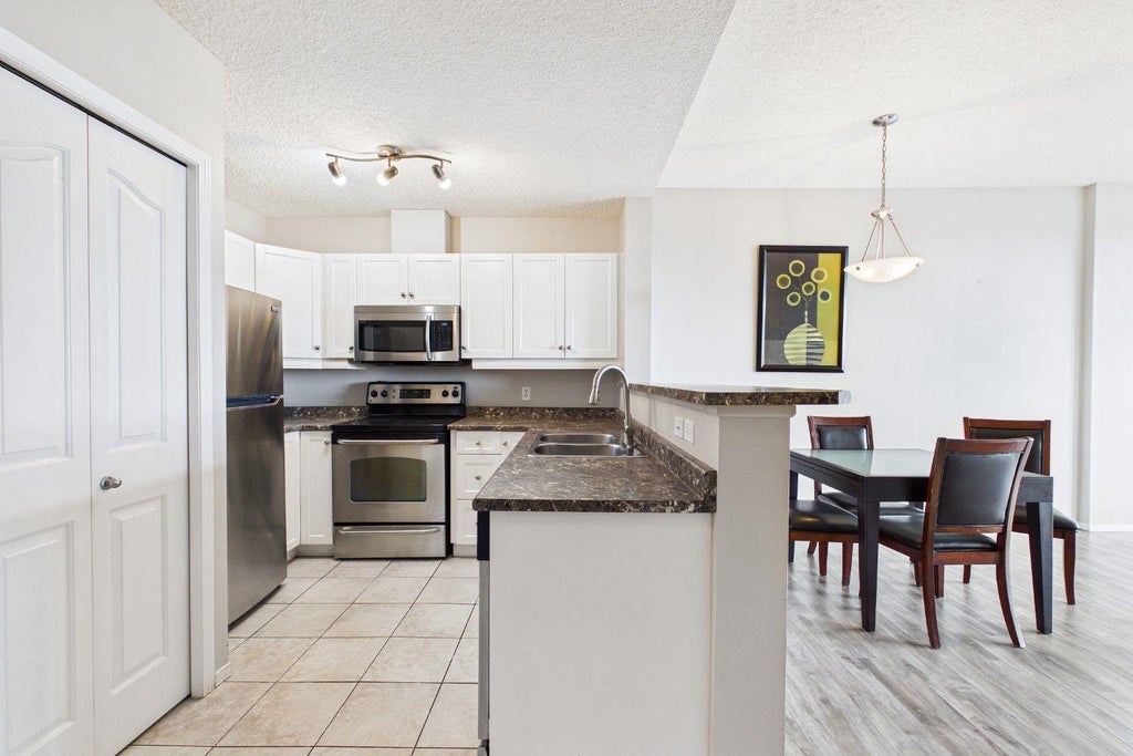 Photo of 1053 10 Street SW #1005, Calgary, AB T2R 1S6 (MLS # A2322374)