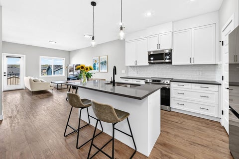 Photo of 182 River Heights Drive, Cochrane, AB T4C 2V1 (MLS # A2339017)