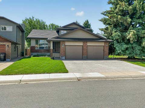Photo of 63 Wildwood Crescent W, Lethbridge, AB T1K 6C8 (MLS # A2318573)