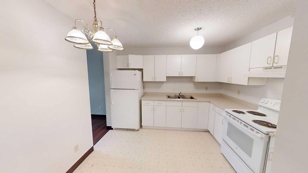 Photo of 5117 44 Street #301, High Prairie, AB T0G 1E0 (MLS # A2265808)