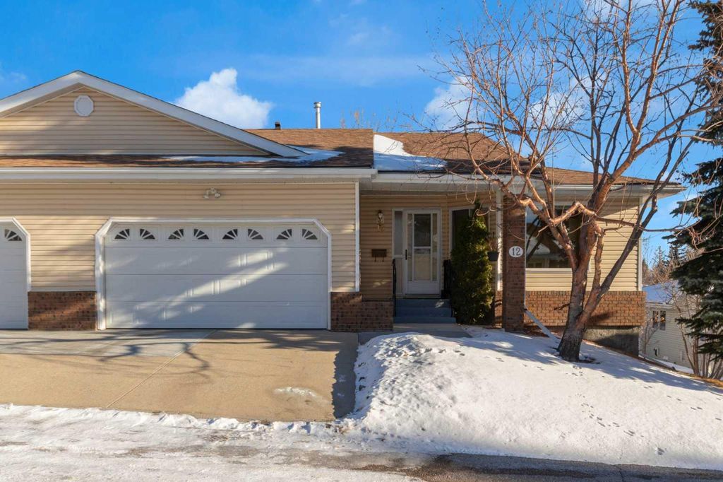 Photo of 12 Vandoos Villas NW, Calgary, AB T3A 4W3 (MLS # A2277705)