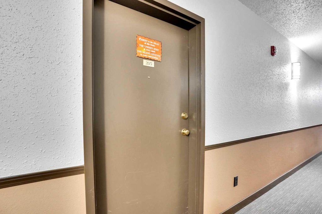 Photo of 21 Dover Point SE #203, Calgary, AB T2B 3K4 (MLS # A2318301)