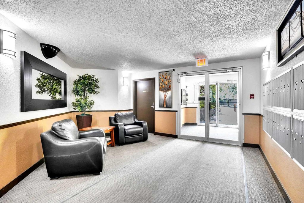 Photo of 21 Dover Point SE #203, Calgary, AB T2B 3K4 (MLS # A2318301)
