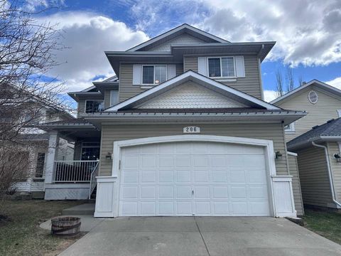 Photo of 206 Sierra Nevada Close SW, Calgary, AB T3H 3H6 (MLS # A2297192)