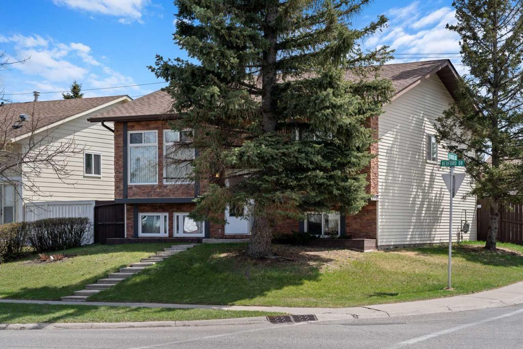 Photo of 75 Bedford Drive NE, Calgary, AB T3K 2N9 (MLS # A2312183)