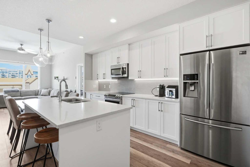 Photo of 8530 8A Avenue SW #404, Calgary, AB T3H 6A7 (MLS # A2324752)