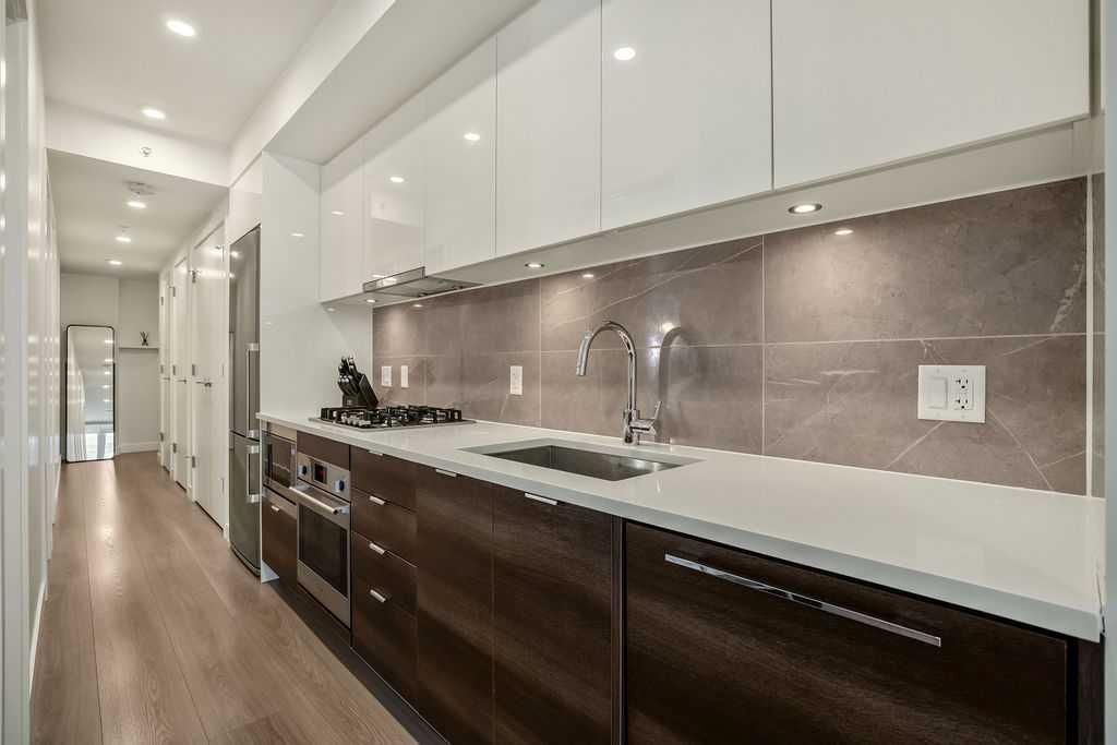 Photo of 108 Waterfront Court SW #103, Calgary, AB T2P 1K7 (MLS # A2255840)
