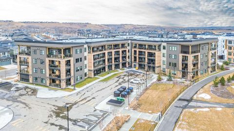Photo of 125 Wolf Hollow Crescent SE #404, Calgary, AB T2X 5K9 (MLS # A2300115)