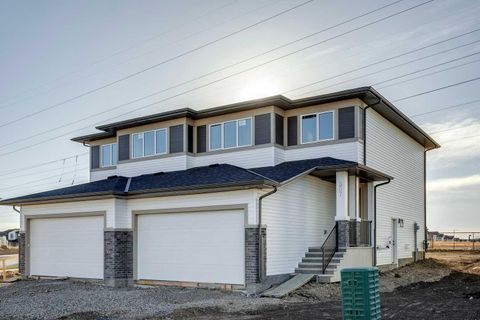 Photo of 307 Dawson Dock Way, Chestermere, AB T1X 2X2 (MLS # A2315690)