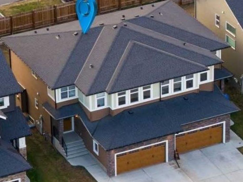 Photo of 243 Kinniburgh Road, Chestermere, AB T1X 0Y7 (MLS # A2262693)