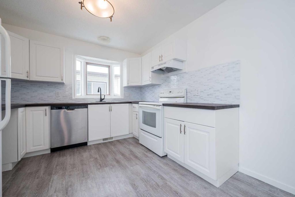 Photo of 10317 89 Street, Grande Prairie, AB T8X 1G2 (MLS # A2287293)