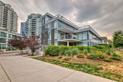 Photo of 88 Waterfront Mews SW #102, Calgary, AB T2P 1K7 (MLS # A2251109)