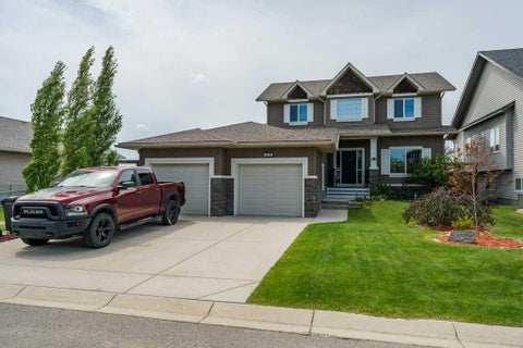 Photo of 472 Sunset Link, Crossfield, AB T0M 0S0 (MLS # A2324153)
