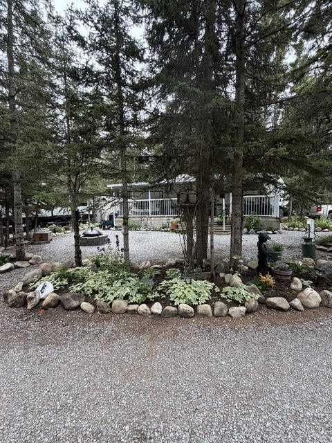 Photo of 16 Timber Circle, Sundre, AB T0M 1X0 (MLS # A2330865)