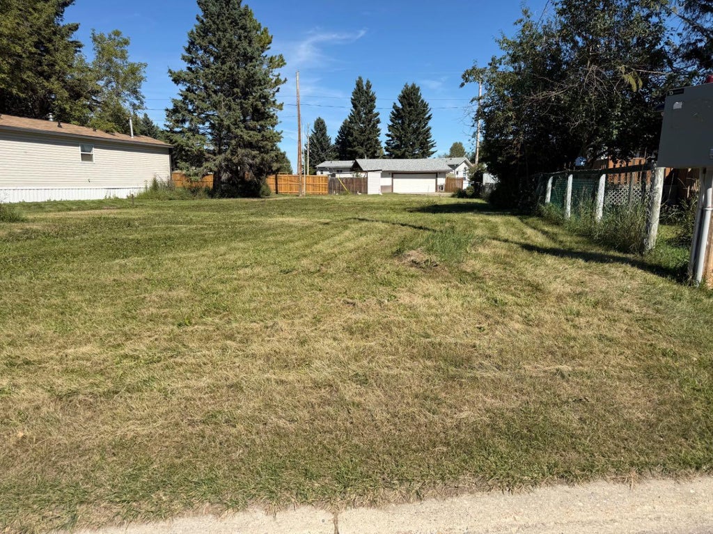 Photo of 231 4 Street NW, Sundre, AB T0M 1X0 (MLS # A2341733)